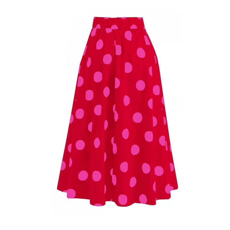 Red skirt with pink oolka dots and red one-piece swimsuit with a large bow detail on the front.