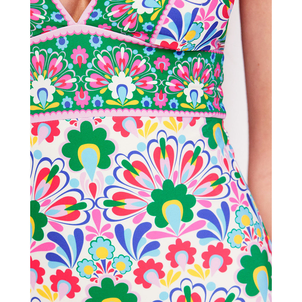 Boden porto v-neck tile print swimsuit with a matching wrap style skirt.