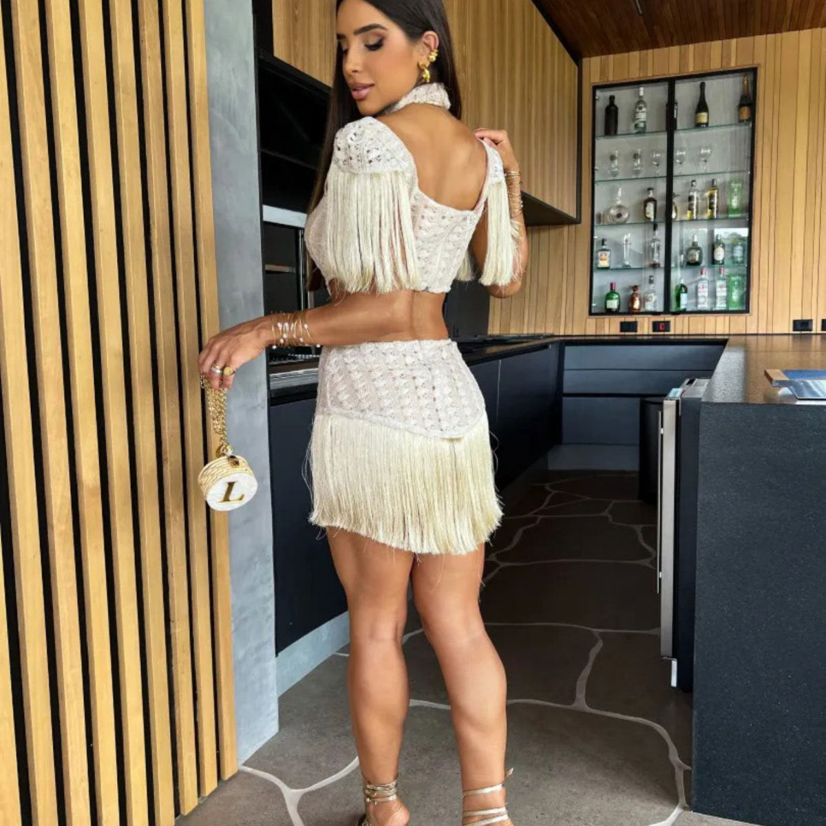 White cutout mini dress with a high collar,open-knit detailing