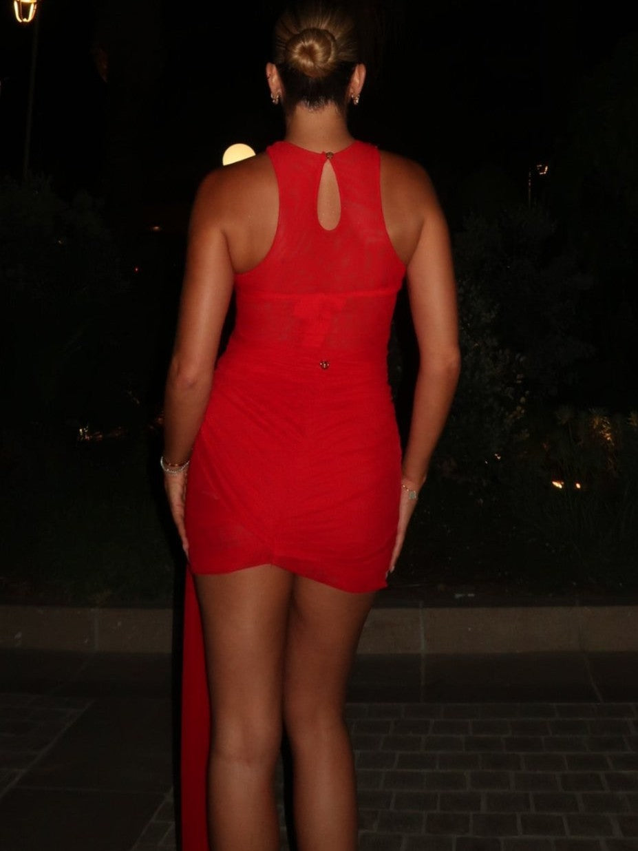 Bold and stunning sleeveless red bodycon dress with a high slit, perfect for evening glamour