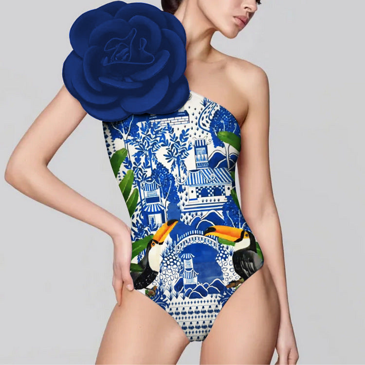 Blue floral print swimsuit set with a matching sarong or wrap skirt.