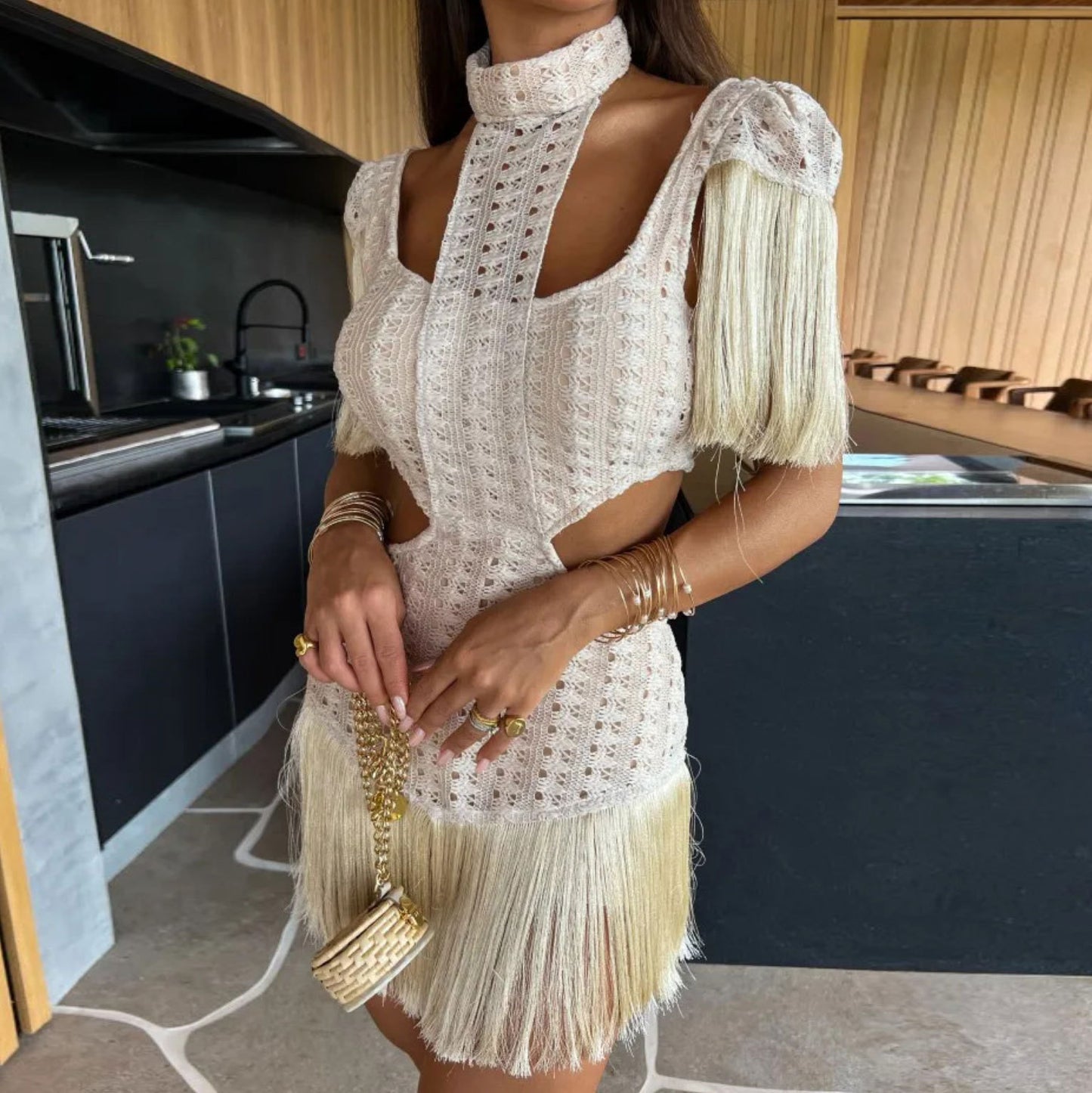 White cutout mini dress with a high collar,open-knit detailing