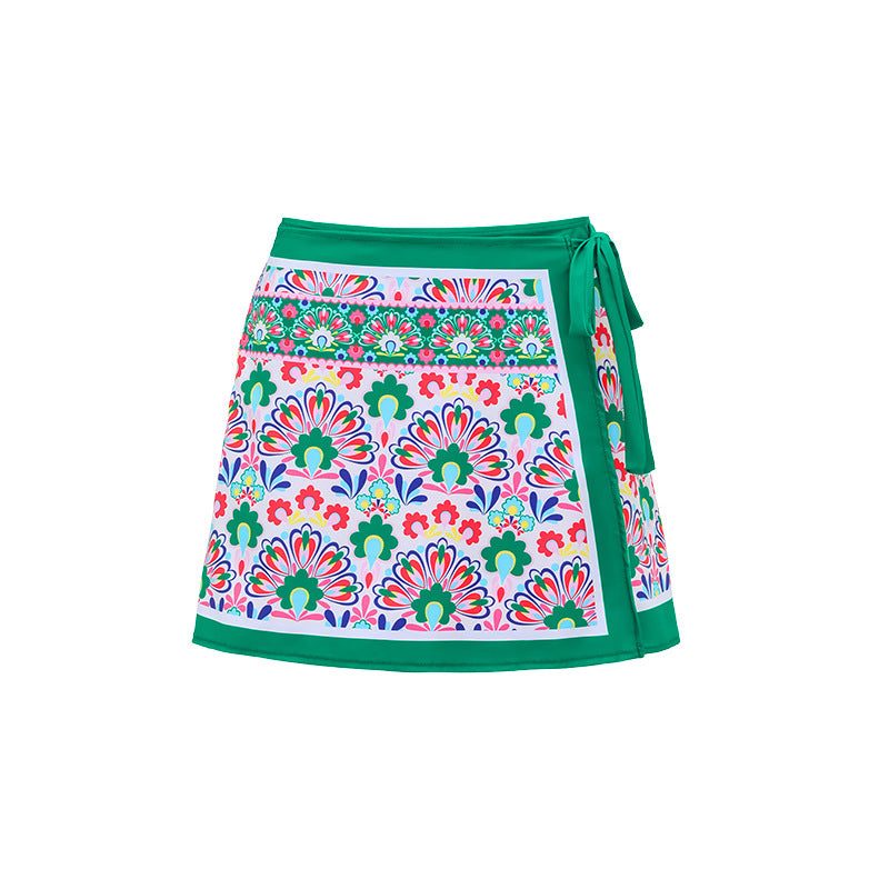 Boden porto v-neck tile print swimsuit with a matching wrap style skirt.
