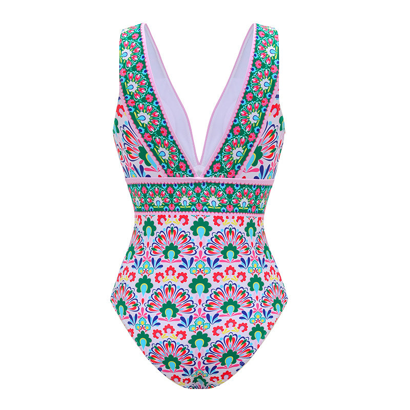 Boden porto v-neck tile print swimsuit with a matching wrap style skirt.