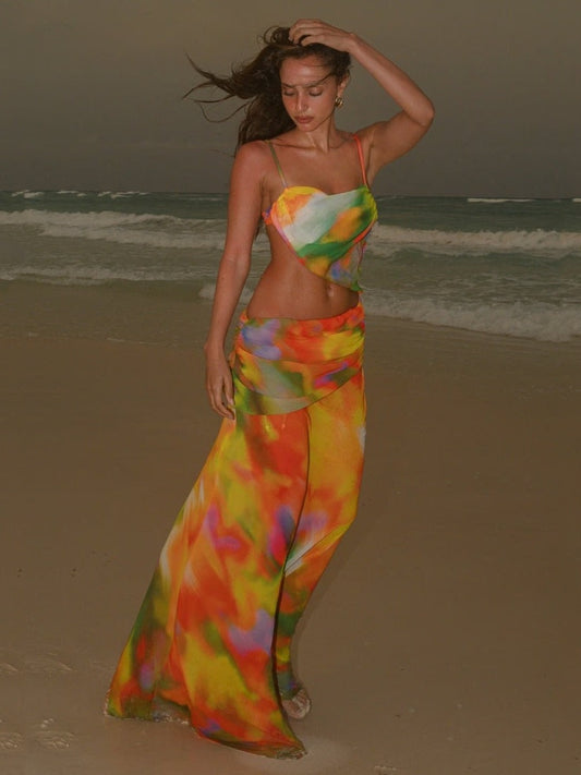Two piece bikini beach,wearing a colorful,patterned sarong or beach cover-up.