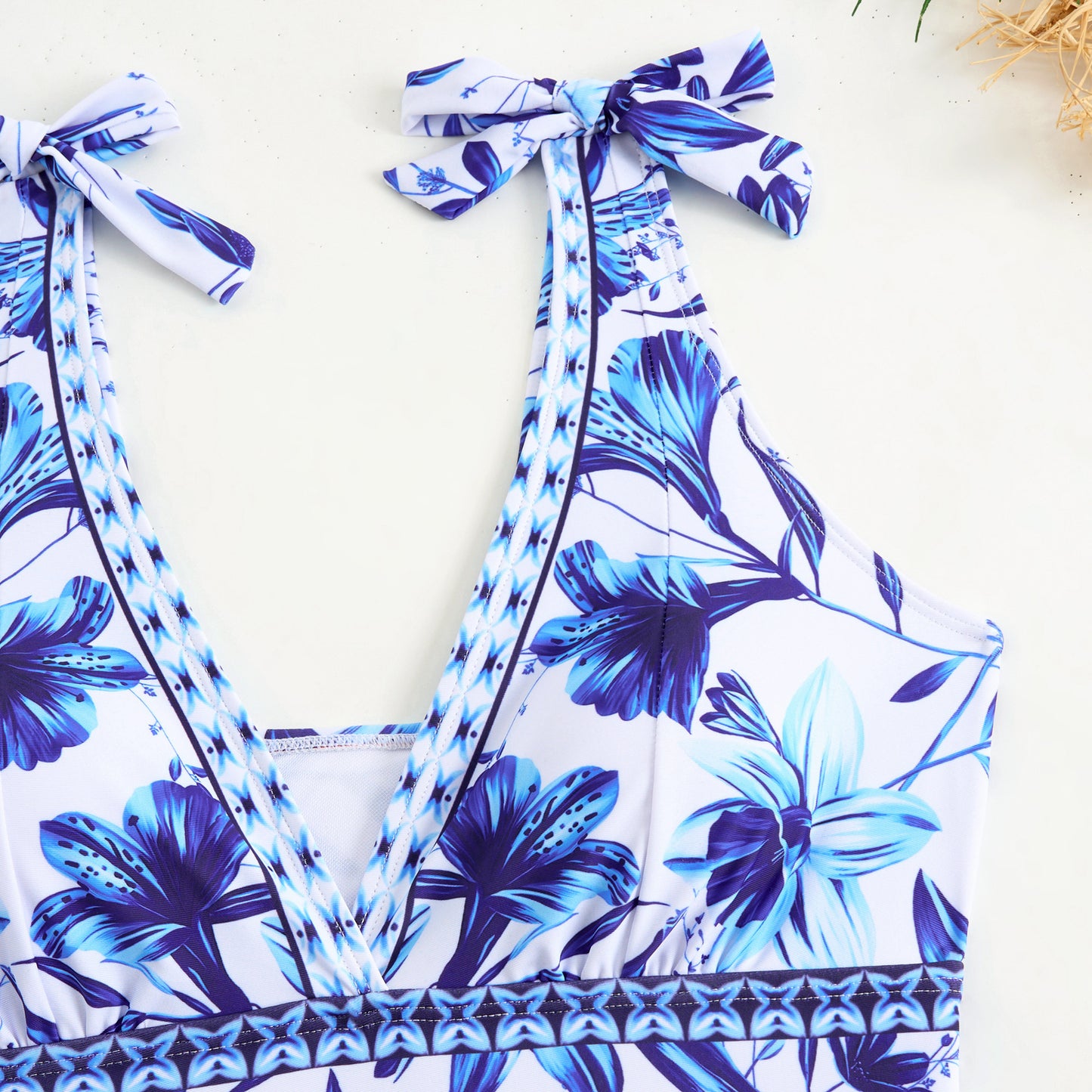 V-neck,blue floral print,swimsuit with a high-wasted sheer skirt